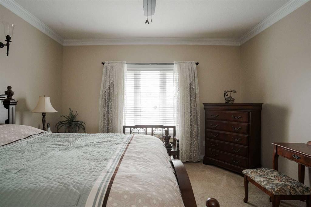 128 Dogwood Lane, Fort Mcmurray, AB - Indoor Photo Showing Bedroom
