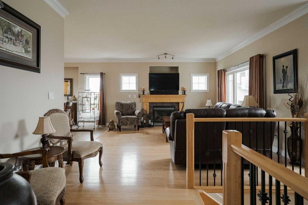 128 Dogwood Lane, Fort Mcmurray, AB - Indoor Photo Showing Living Room With Fireplace