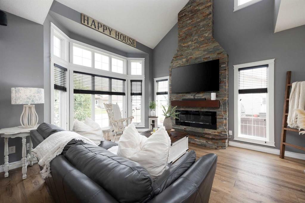 162 Chestnut Way, Fort Mcmurray, AB - Indoor Photo Showing Living Room With Fireplace