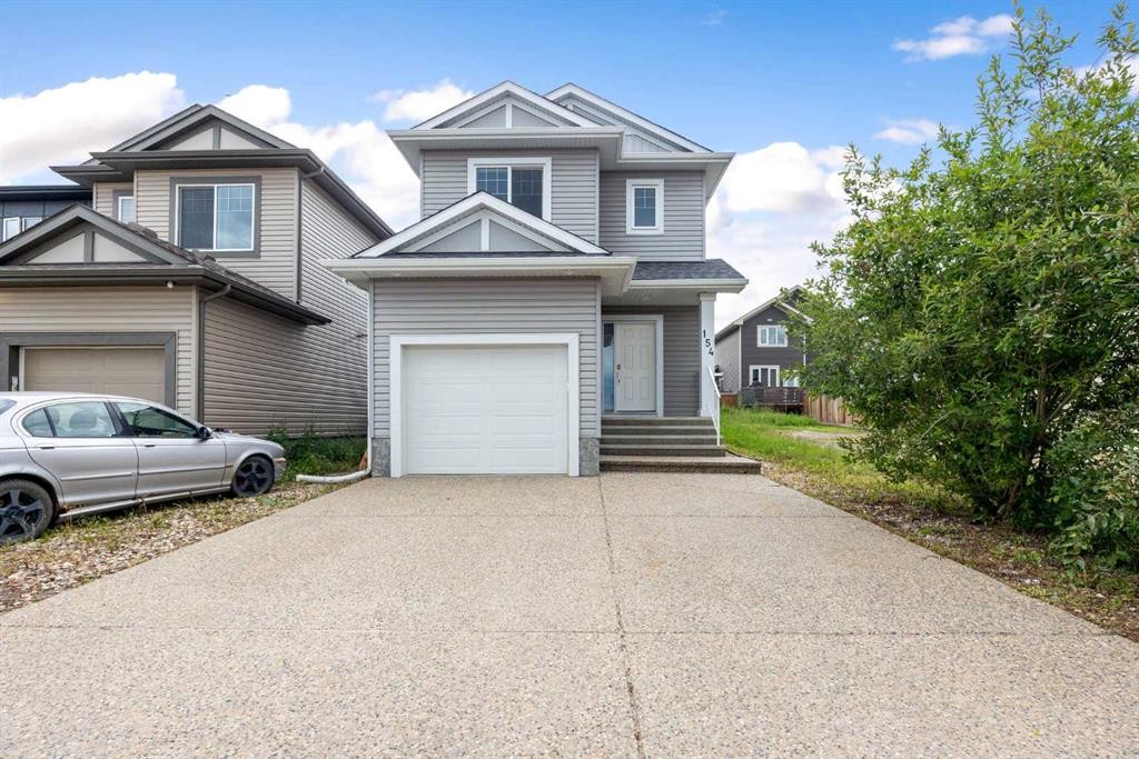 154 Athabasca Crescent, Fort Mcmurray, AB - Outdoor With Facade