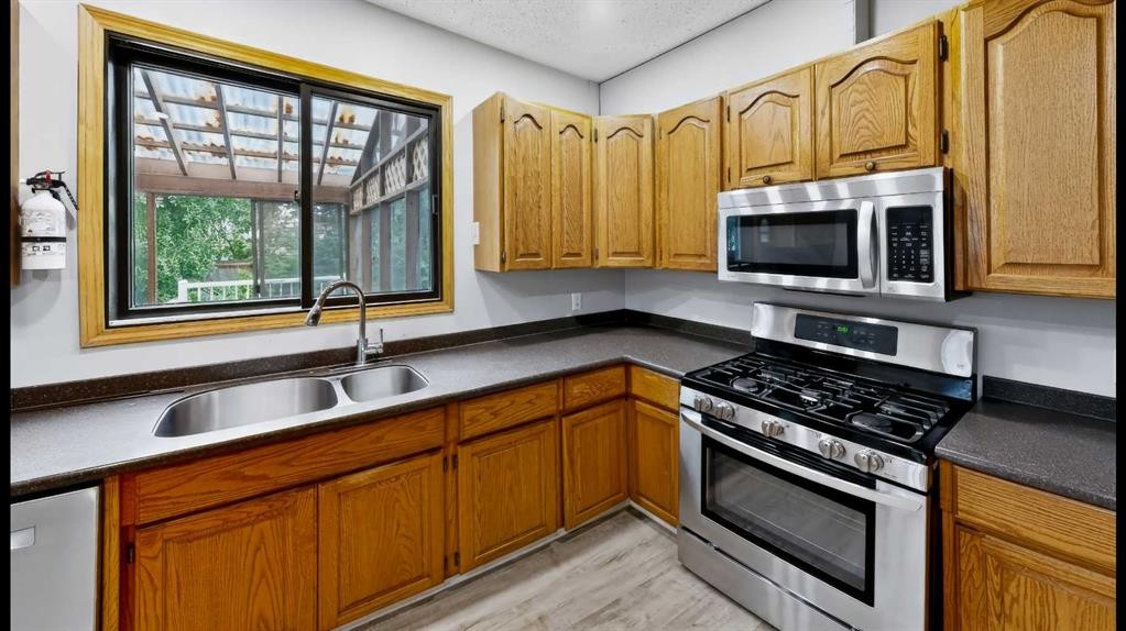 245 Bacon Place, Fort Mcmurray, AB - Indoor Photo Showing Kitchen With Double Sink