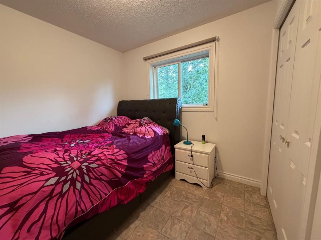 708 6 Street, Smith, AB - Indoor Photo Showing Bedroom