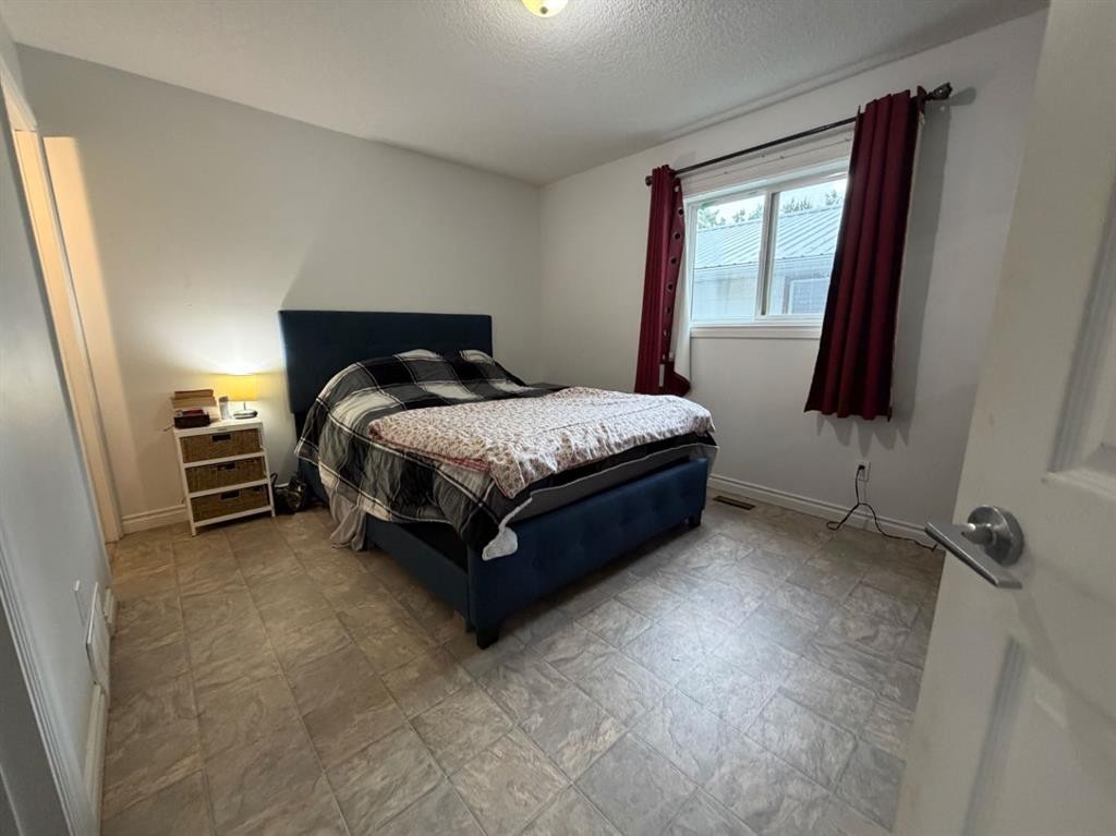 708 6 Street, Smith, AB - Indoor Photo Showing Bedroom