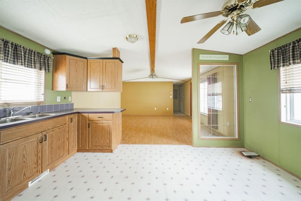 152 Cree Road, Fort Mcmurray, AB - Indoor Photo Showing Kitchen With Double Sink