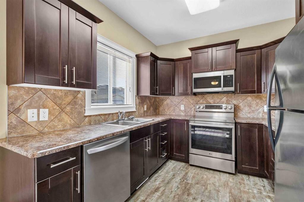 164 Fireweed Crescent, Fort Mcmurray, AB - Indoor Photo Showing Kitchen With Double Sink