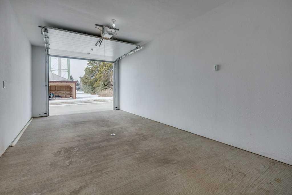 2-5414 51 Street, Rimbey, AB - Indoor Photo Showing Garage