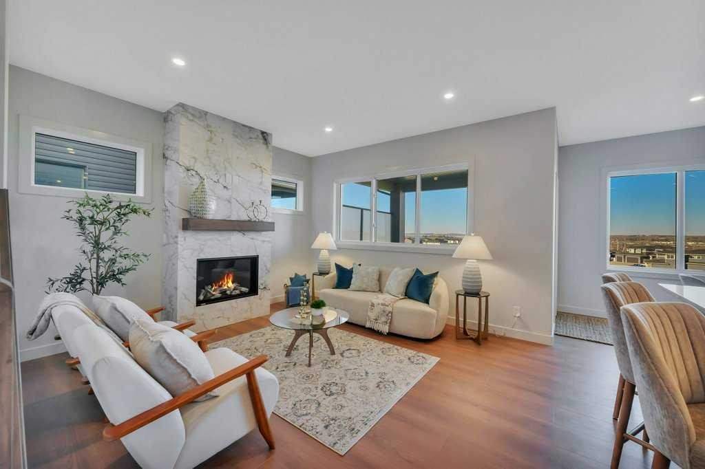7 Vincent Gate, Sylvan Lake, AB - Indoor Photo Showing Living Room With Fireplace