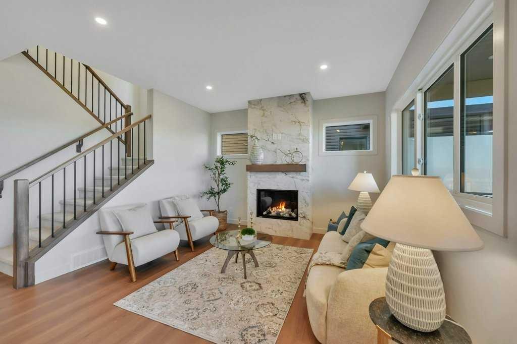 7 Vincent Gate, Sylvan Lake, AB - Indoor Photo Showing Living Room With Fireplace