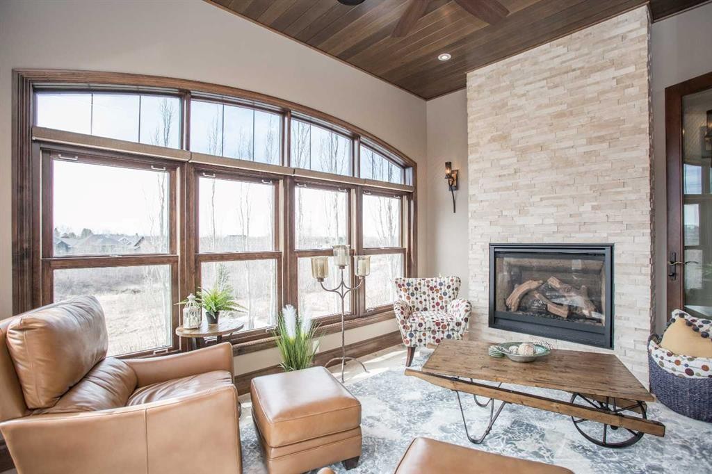 32 Sagewood Close, Red Deer, AB - Indoor Photo Showing Living Room With Fireplace