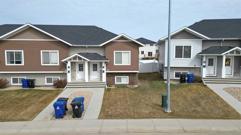 2-18 Athens Road, Blackfalds, AB - Outdoor With Facade
