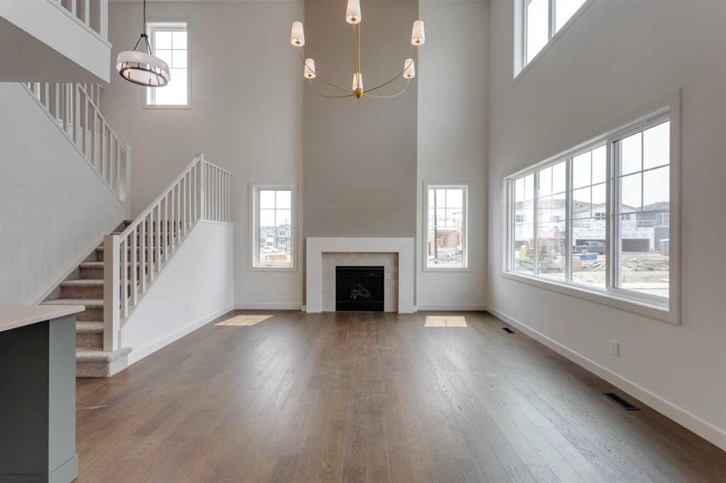 21 Bayview Mews Sw, Airdrie, AB - Indoor With Fireplace