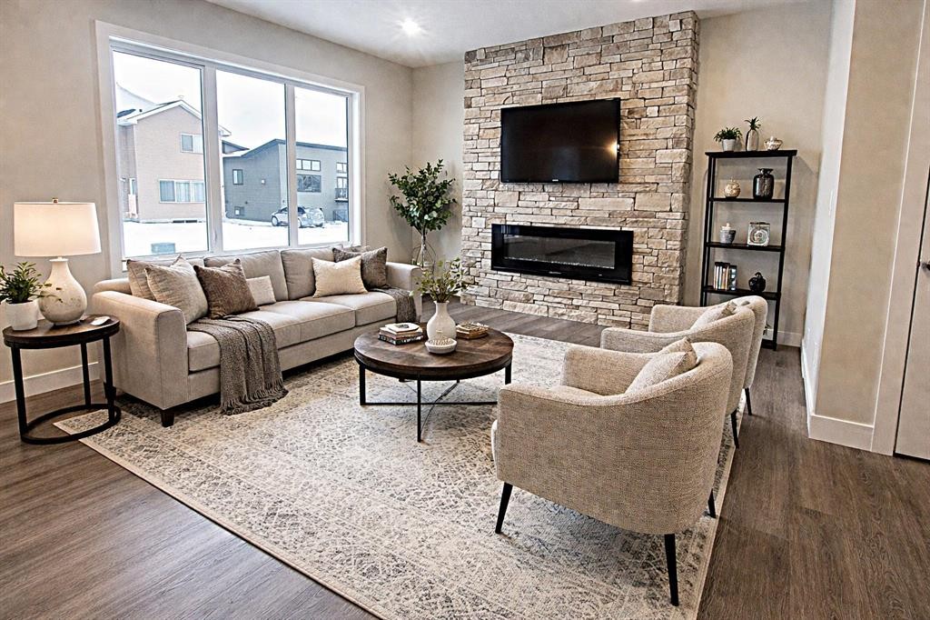 49 Emmett Crescent, Red Deer, AB - Indoor Photo Showing Living Room With Fireplace