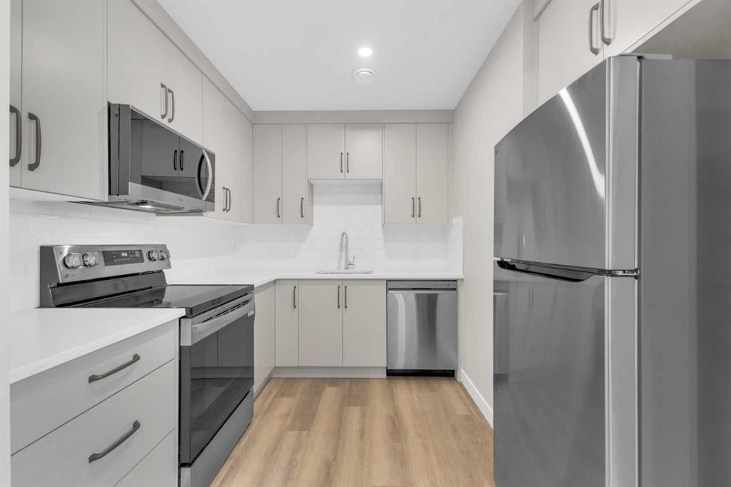 114 Palmer Circle, Blackfalds, AB - Indoor Photo Showing Kitchen With Upgraded Kitchen