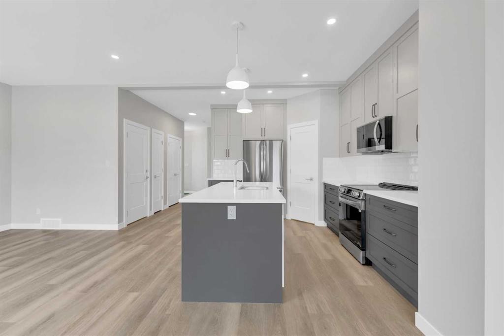 114 Palmer Circle, Blackfalds, AB - Indoor Photo Showing Kitchen With Upgraded Kitchen