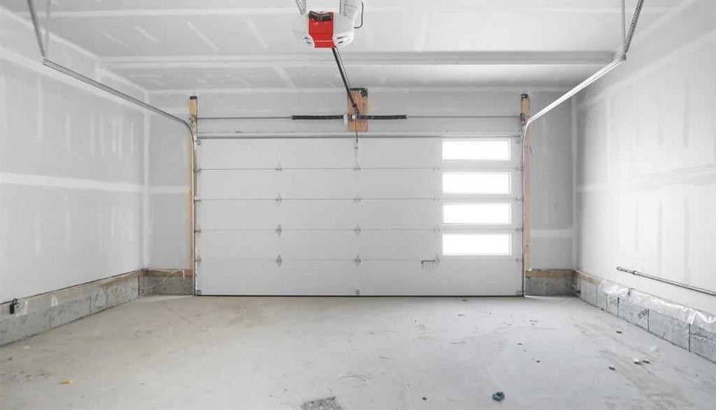 47 Everson Close, Red Deer, AB - Indoor Photo Showing Garage
