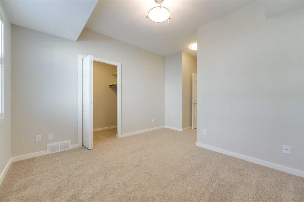 D3-5300 Vista Trail, Blackfalds, AB - Indoor Photo Showing Other Room
