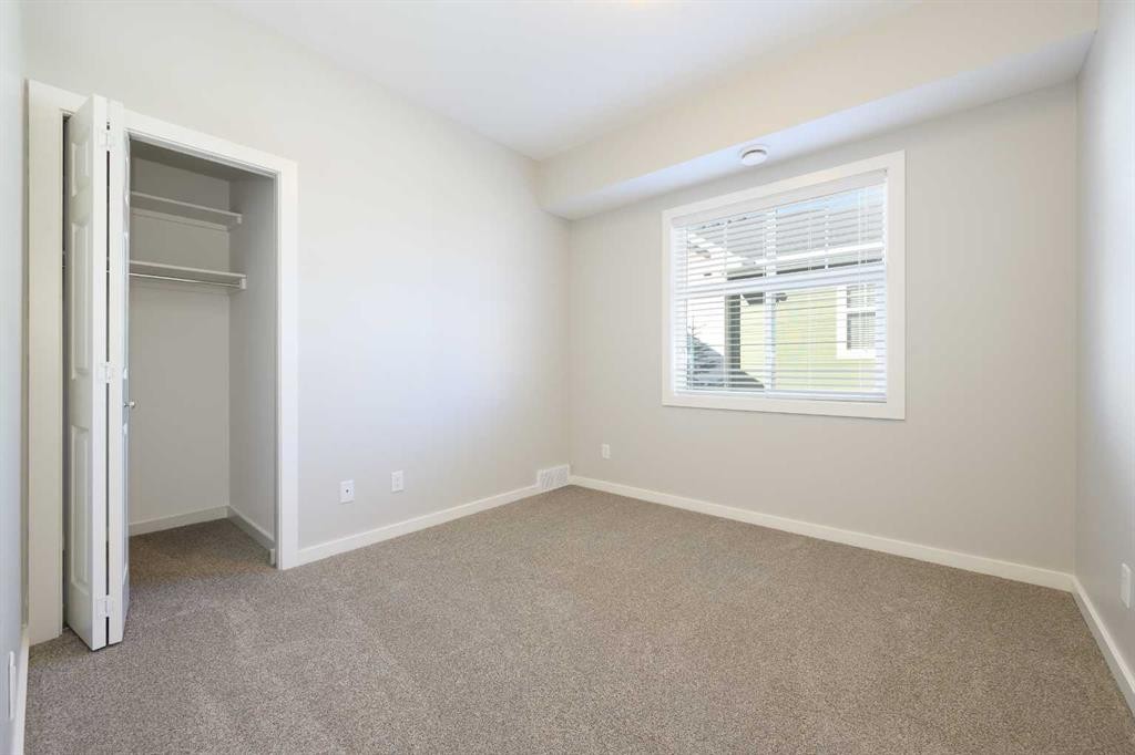 D3-5300 Vista Trail, Blackfalds, AB - Indoor Photo Showing Other Room