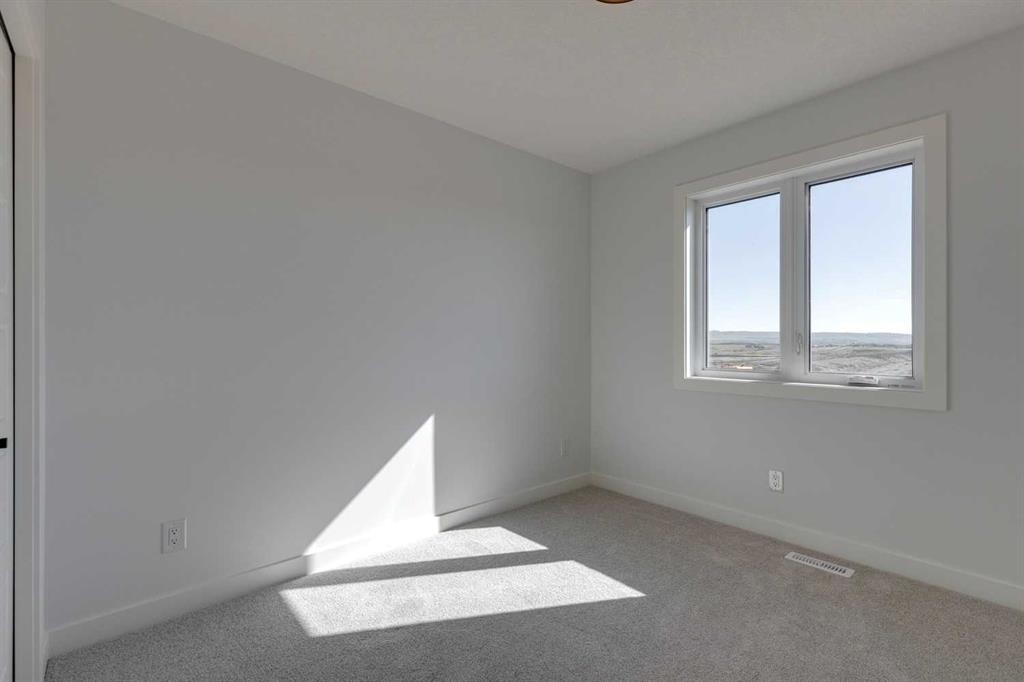 95 Southborough Crescent, Cochrane, AB - Indoor Photo Showing Other Room