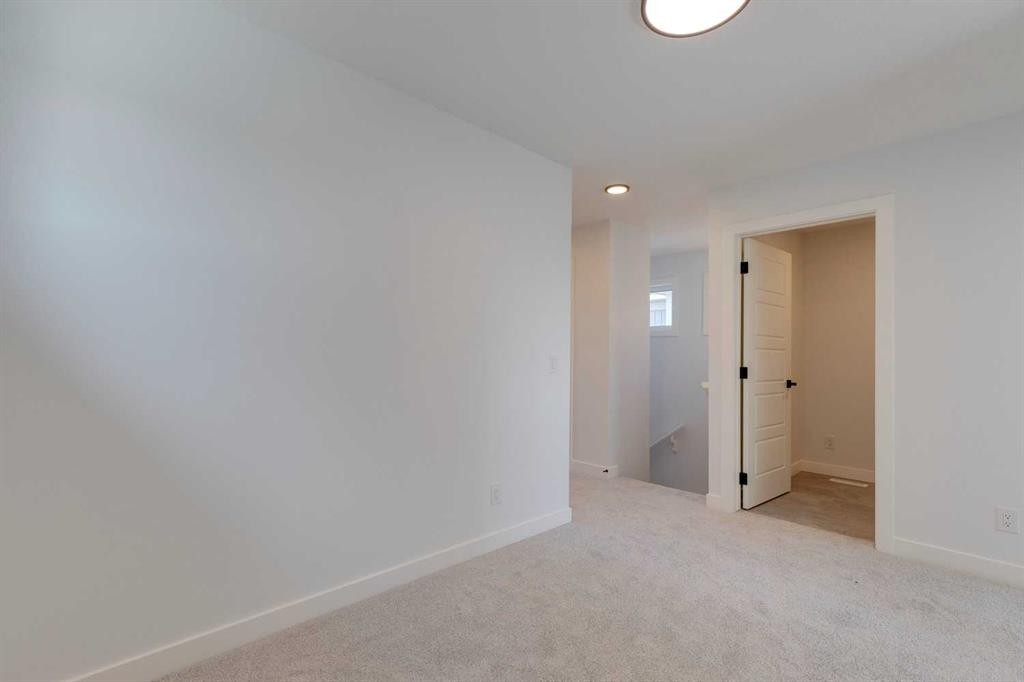 95 Southborough Crescent, Cochrane, AB - Indoor Photo Showing Other Room