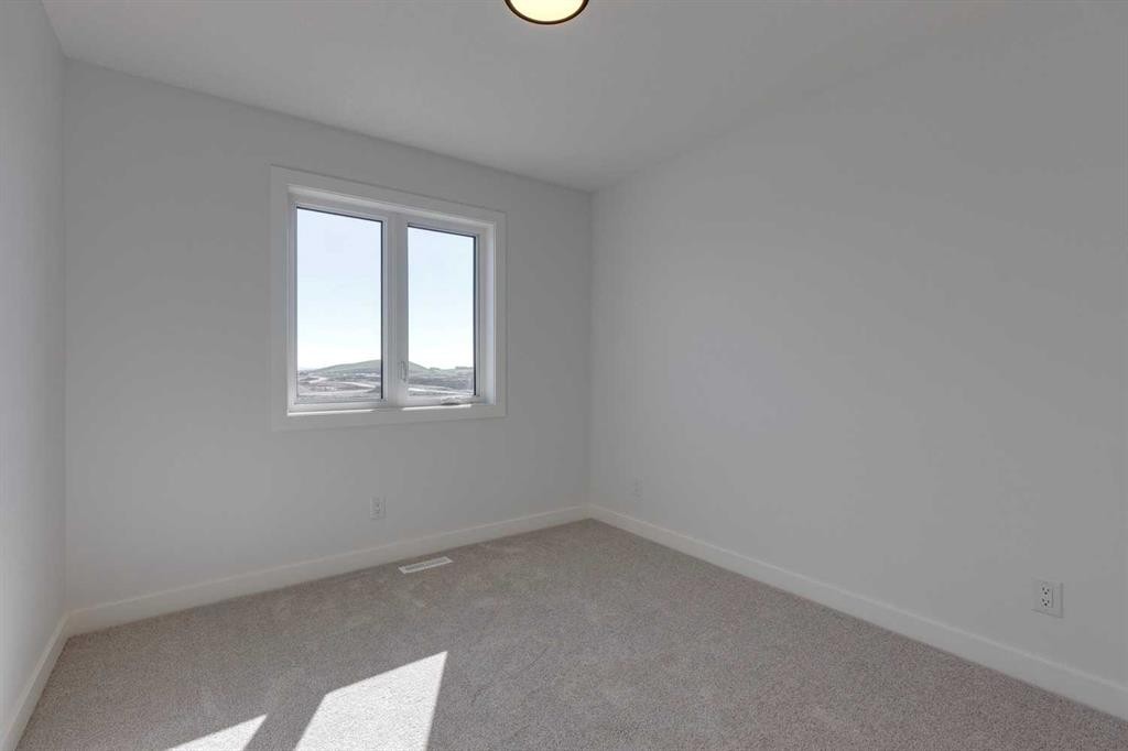 95 Southborough Crescent, Cochrane, AB - Indoor Photo Showing Other Room