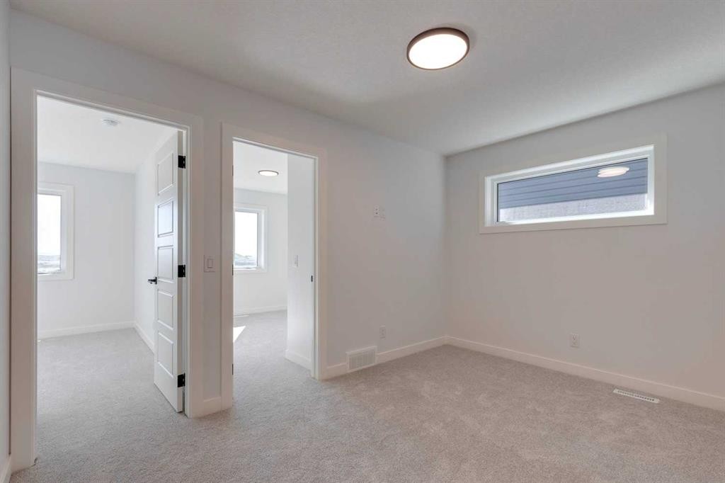 95 Southborough Crescent, Cochrane, AB - Indoor Photo Showing Other Room