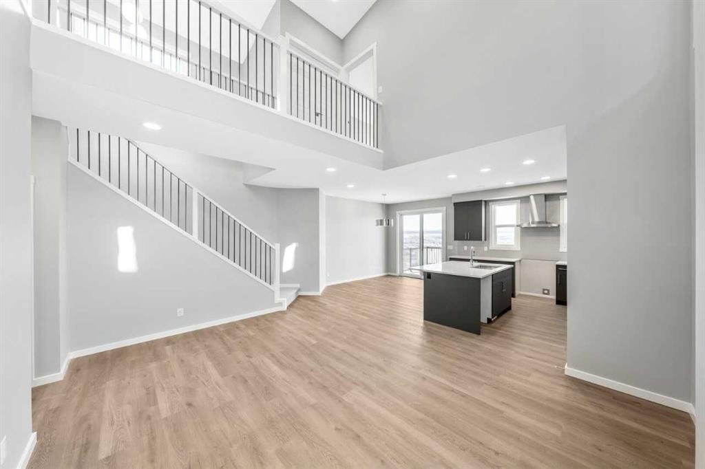 16 Heritage Link, Cochrane, AB - Indoor Photo Showing Other Room