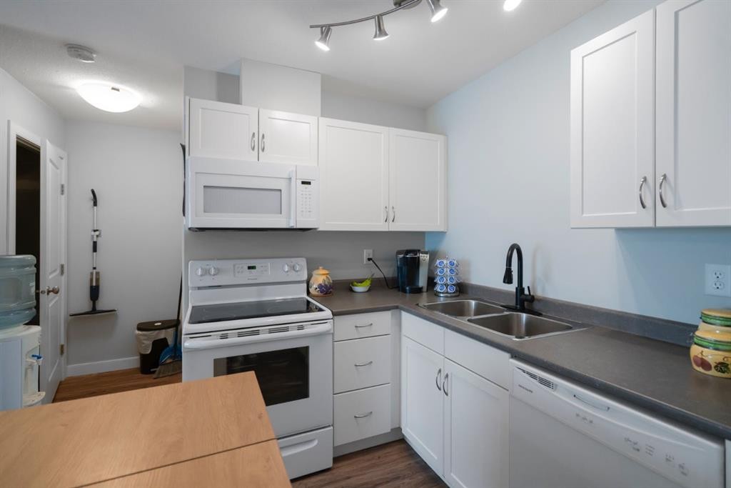 G-5220 41 Street, Camrose, AB - Indoor Photo Showing Kitchen With Double Sink
