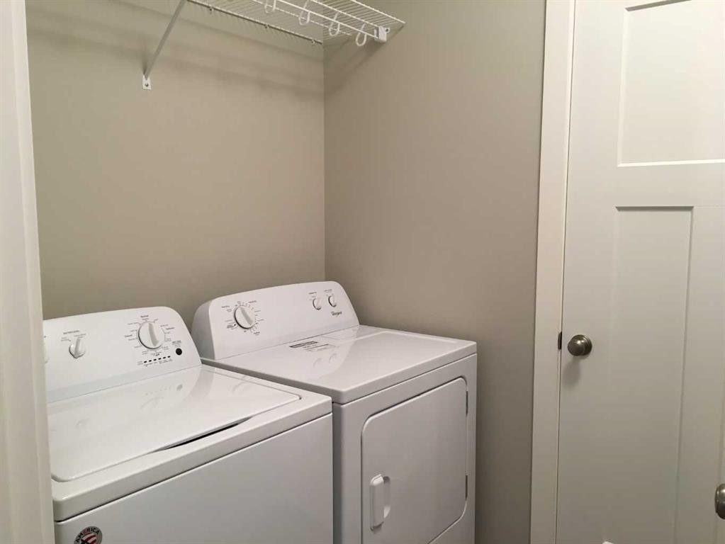 61 Maclean Close, Blackfalds, AB - Indoor Photo Showing Laundry Room