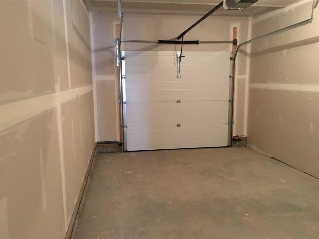 61 Maclean Close, Blackfalds, AB - Indoor Photo Showing Garage