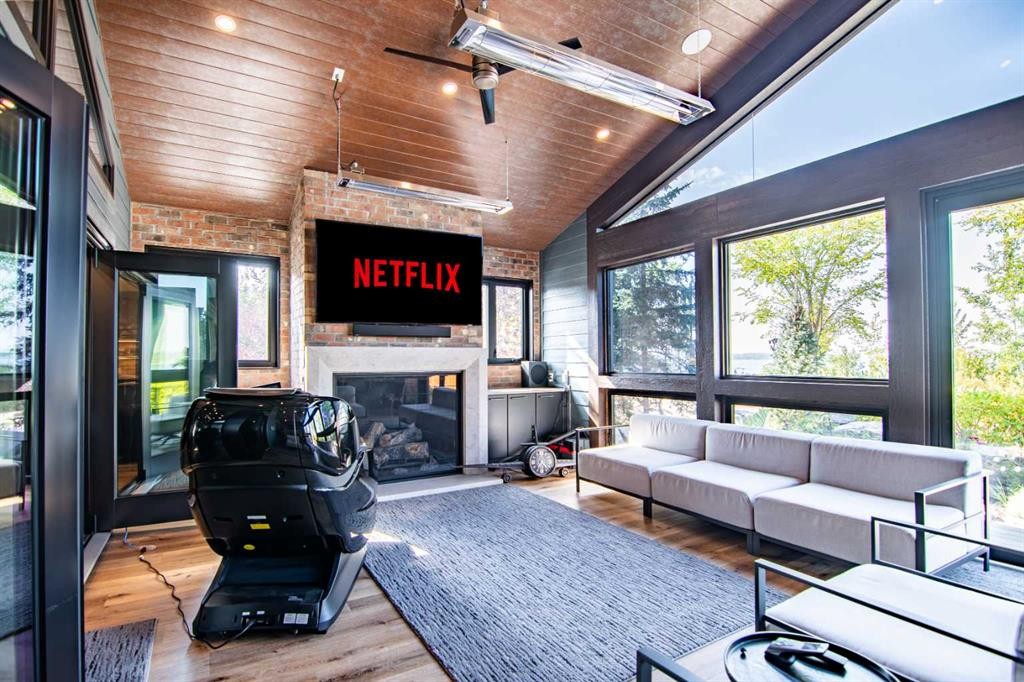 3417 Lakeshore Drive, Sylvan Lake, AB - Indoor Photo Showing Other Room With Fireplace