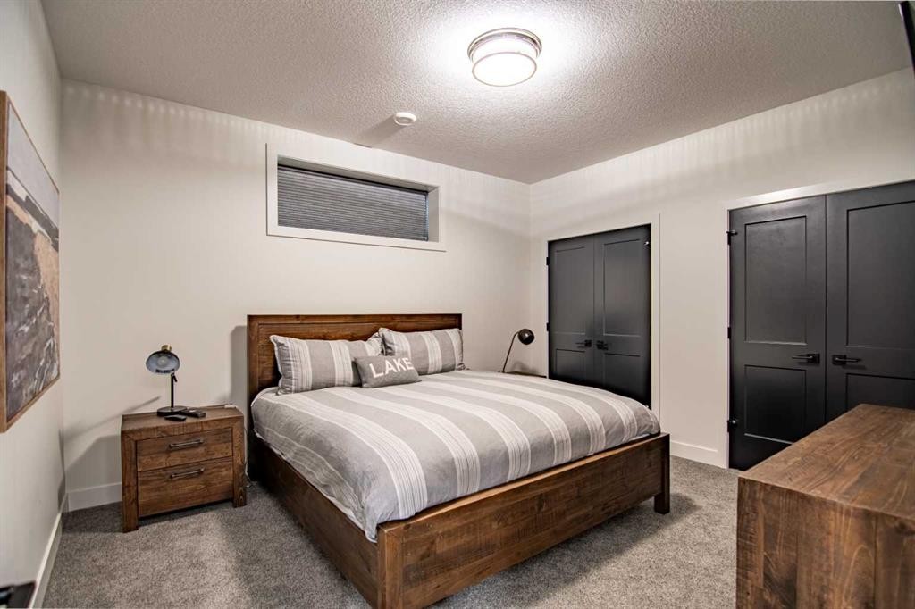 3417 Lakeshore Drive, Sylvan Lake, AB - Indoor Photo Showing Bedroom