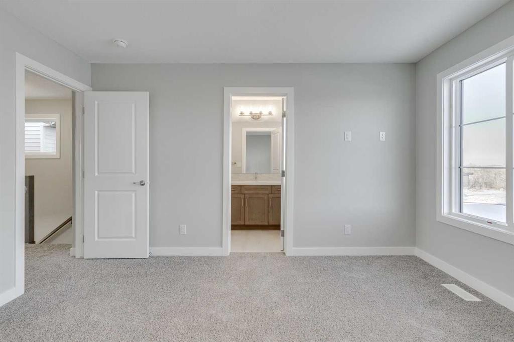 113 Silverton Glen Way Sw, Calgary, AB - Indoor Photo Showing Other Room