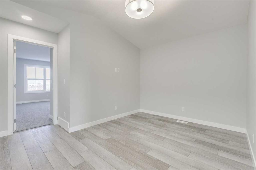 121 Silverton Glen Way Sw, Calgary, AB - Indoor Photo Showing Other Room
