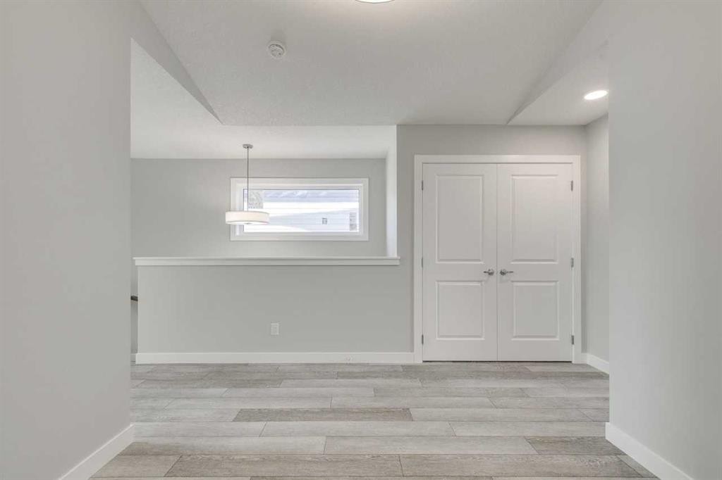 121 Silverton Glen Way Sw, Calgary, AB - Indoor Photo Showing Other Room