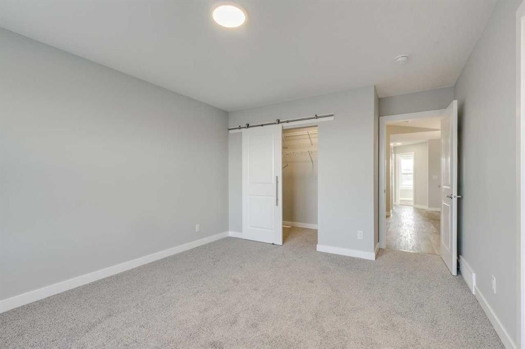 121 Silverton Glen Way Sw, Calgary, AB - Indoor Photo Showing Other Room