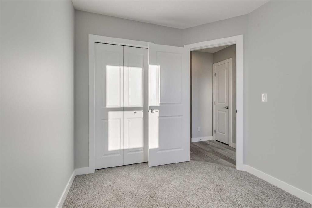121 Silverton Glen Way Sw, Calgary, AB - Indoor Photo Showing Other Room