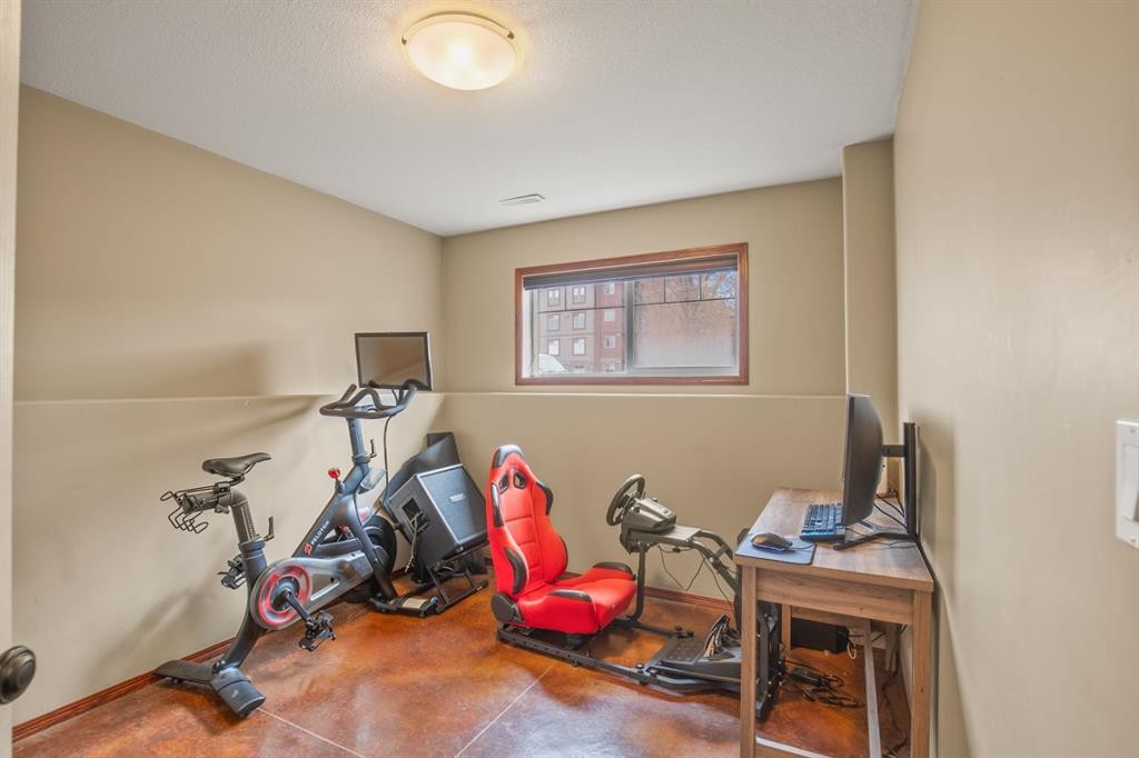 56 Ironstone Drive, Red Deer, AB - Indoor Photo Showing Gym Room