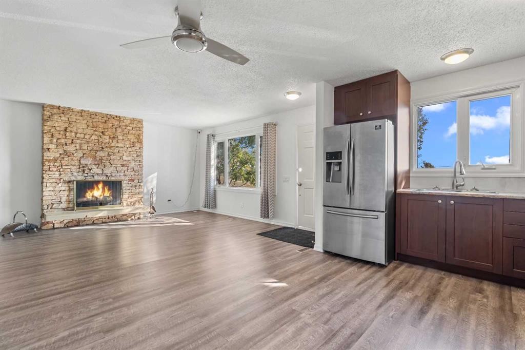 844 Rundlecairn Way Ne, Calgary, AB - Indoor With Fireplace