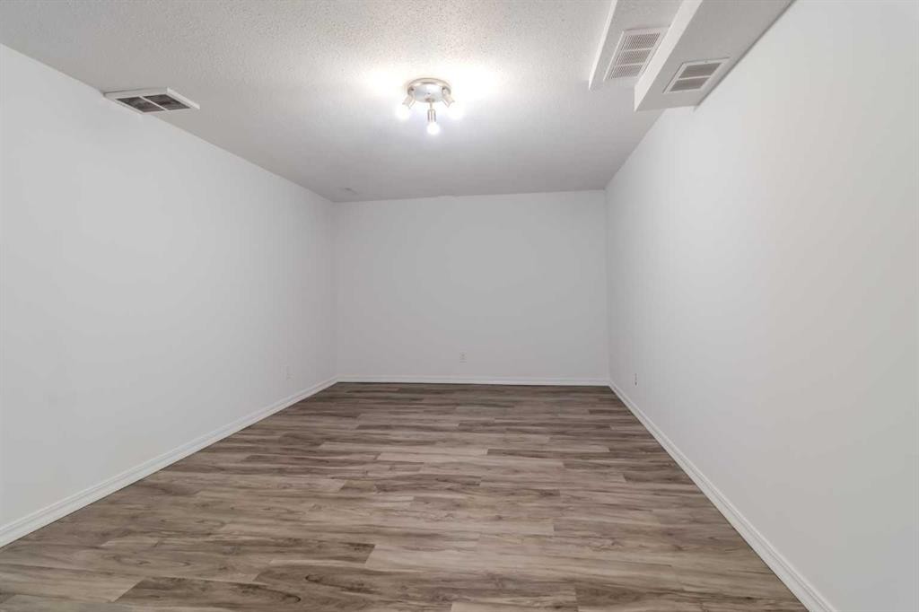 844 Rundlecairn Way Ne, Calgary, AB - Indoor Photo Showing Other Room
