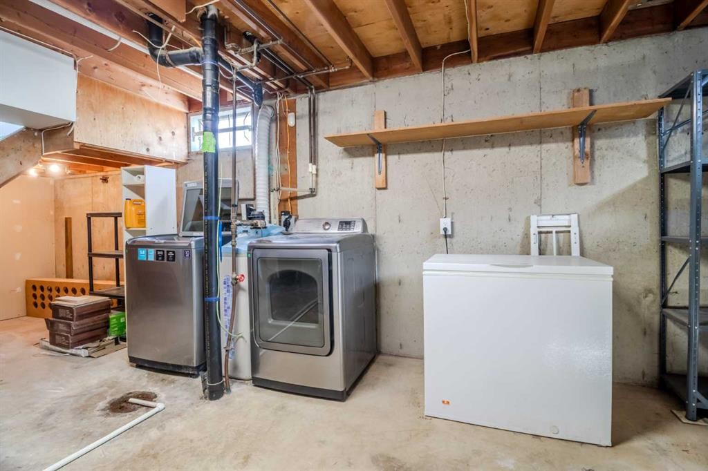 844 Rundlecairn Way Ne, Calgary, AB - Indoor Photo Showing Laundry Room