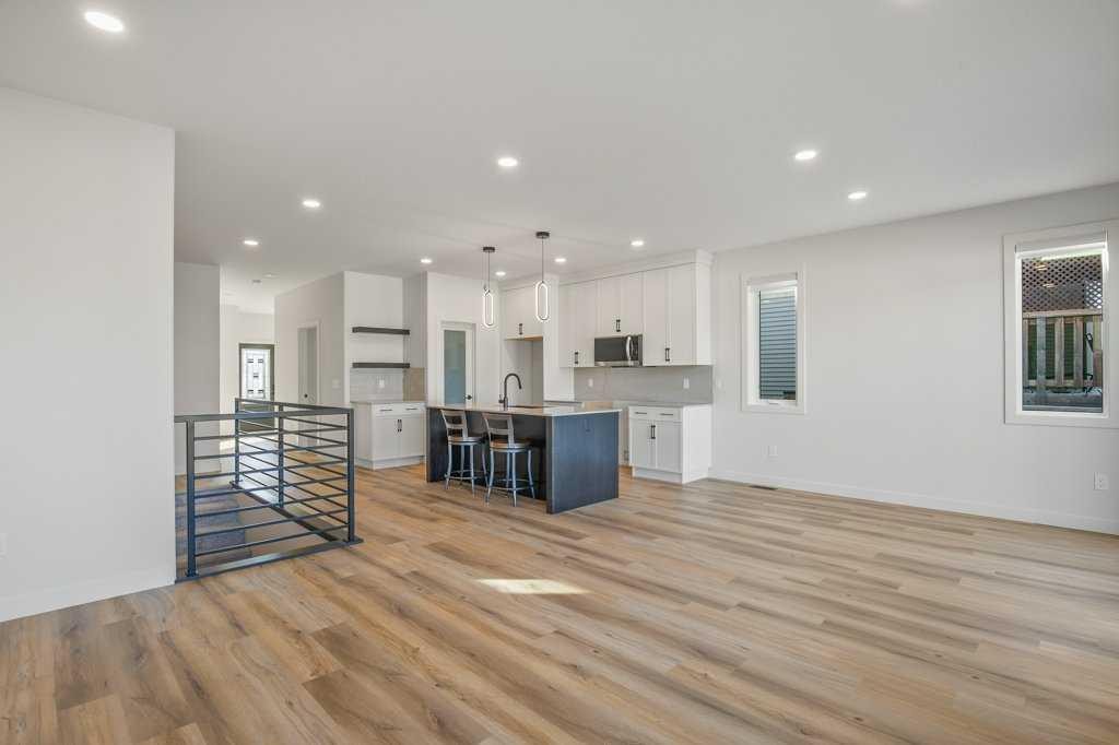 151 Cedar Square, Blackfalds, AB - Indoor Photo Showing Kitchen With Upgraded Kitchen