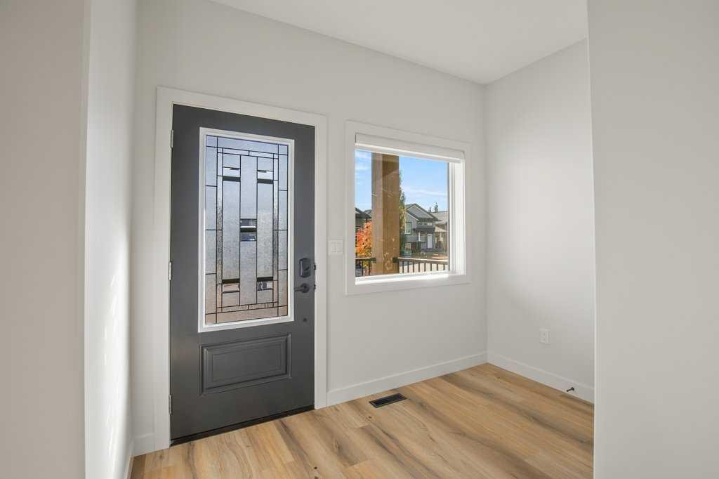 151 Cedar Square, Blackfalds, AB - Indoor Photo Showing Other Room