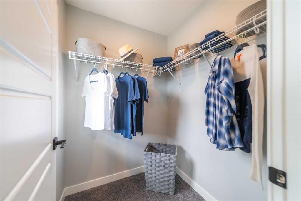704 Langley Terrace Se, Airdrie, AB - Indoor With Storage