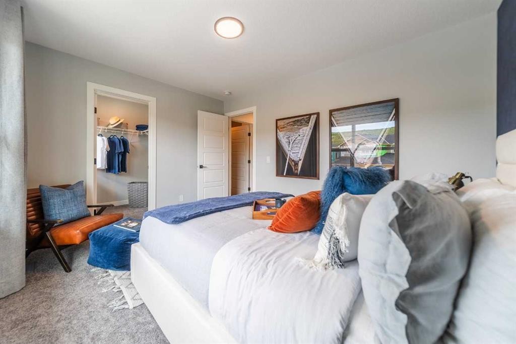 704 Langley Terrace Se, Airdrie, AB - Indoor Photo Showing Bedroom