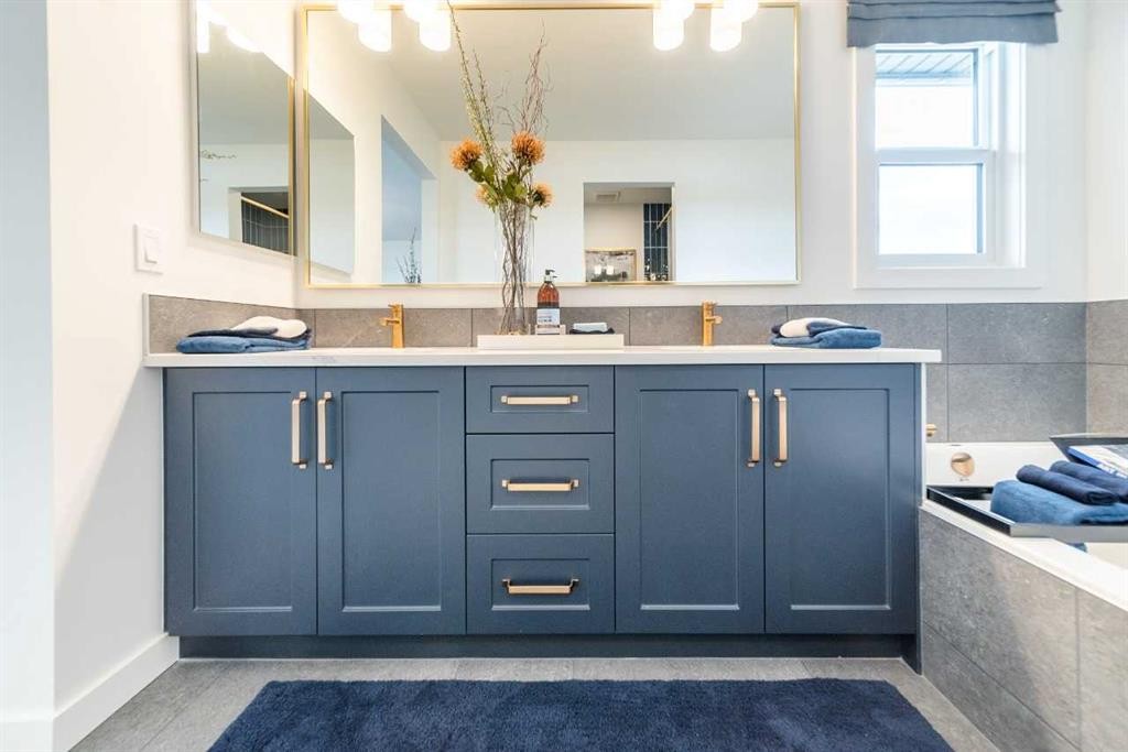 704 Langley Terrace Se, Airdrie, AB - Indoor Photo Showing Bathroom