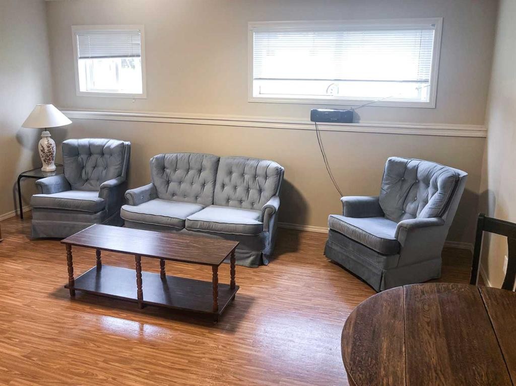 7017 Deer Street, Lacombe, AB - Indoor Photo Showing Living Room