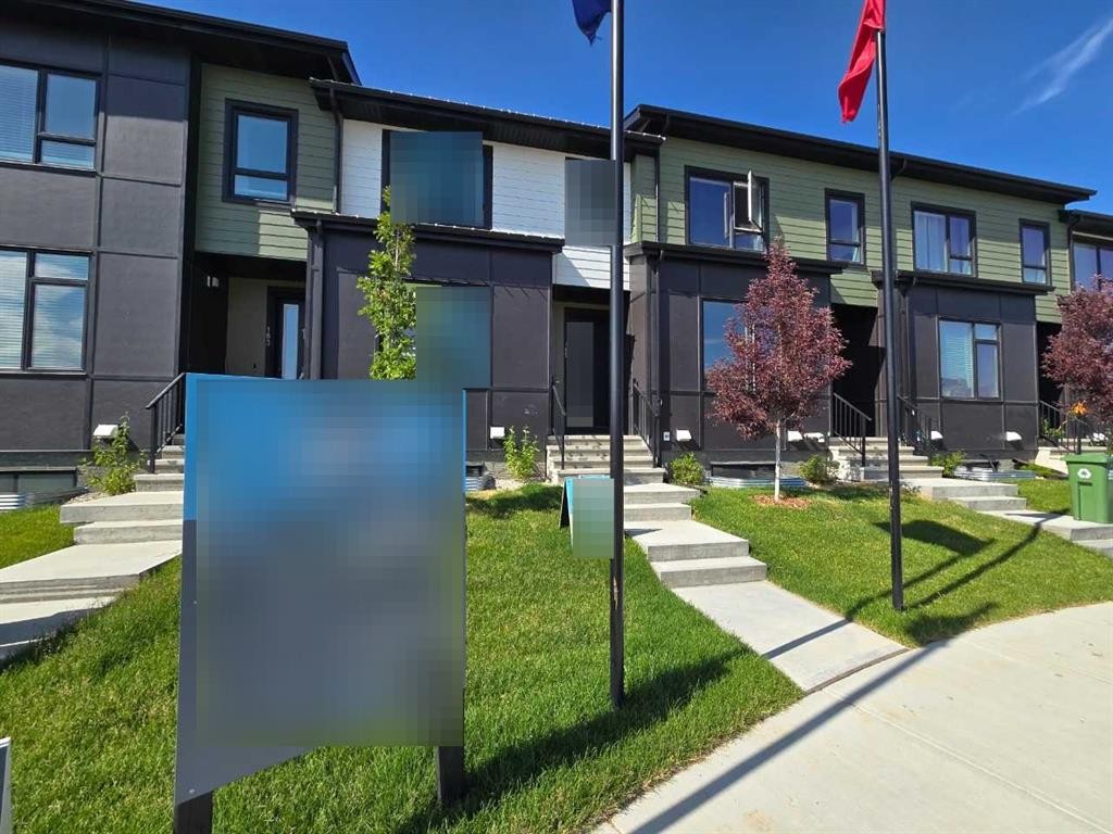 225 Vantage Drive, Cochrane, AB - Outdoor With Facade
