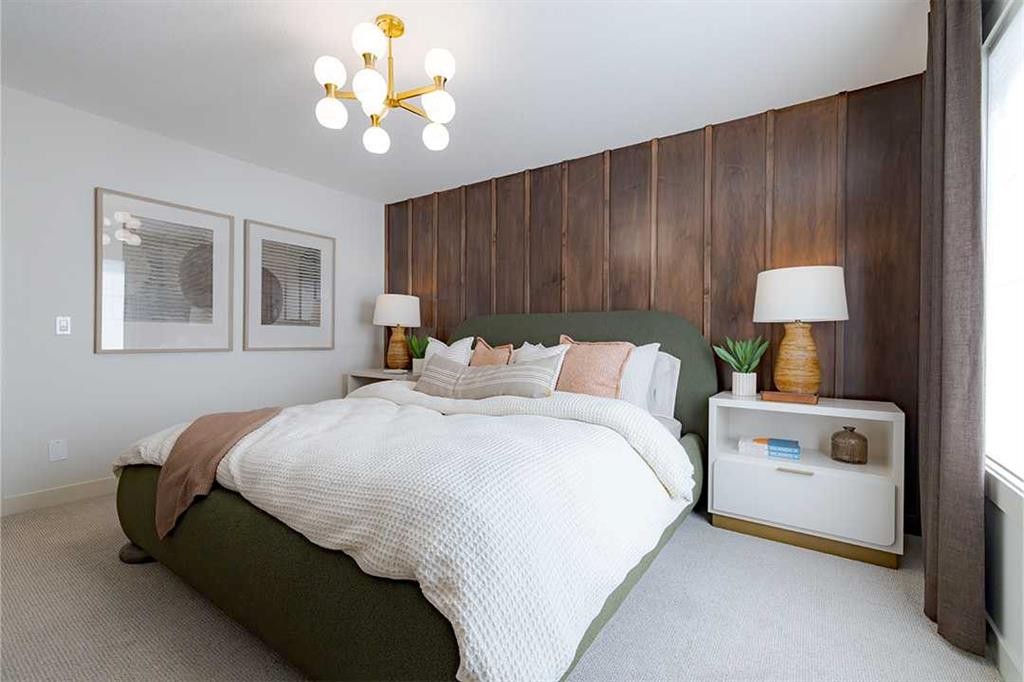 257 Amblestone Crescent Nw, Calgary, AB - Indoor Photo Showing Bedroom
