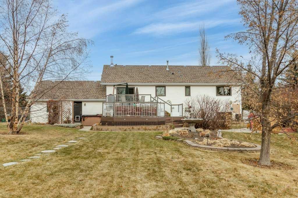 45 Ravenscrag Crescent North, Norglenwold, AB - Outdoor With Deck Patio Veranda