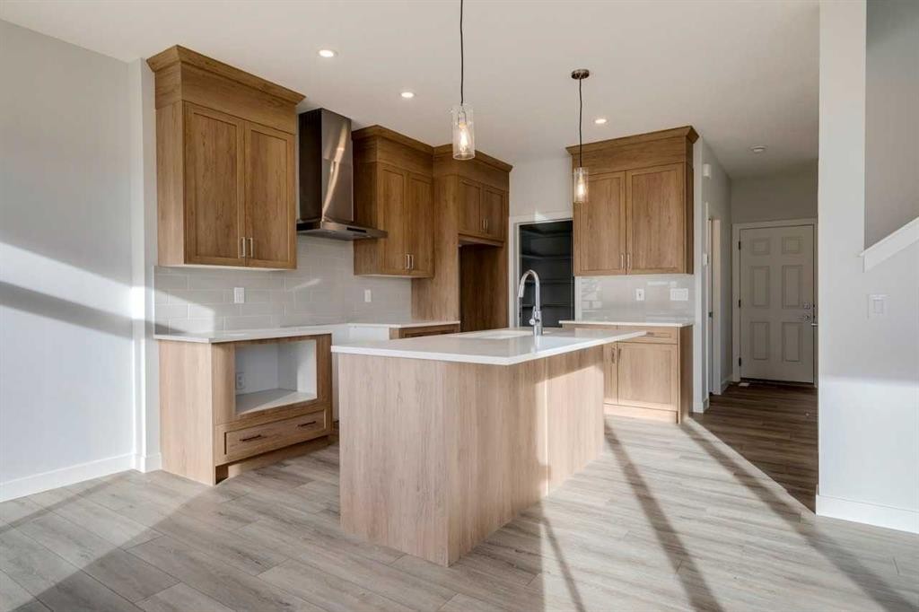 303 Dawson Dock Way, Chestermere, AB - Indoor Photo Showing Kitchen With Upgraded Kitchen